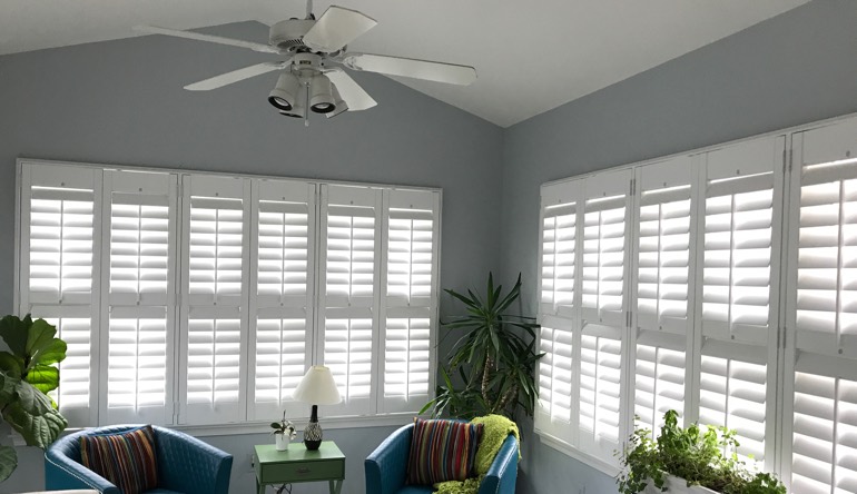 Phoenix living room with fan and shutters